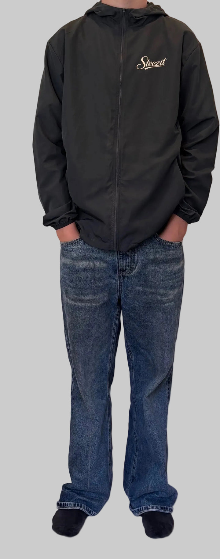 Lightweight windbreaker-style hooded sports jacket